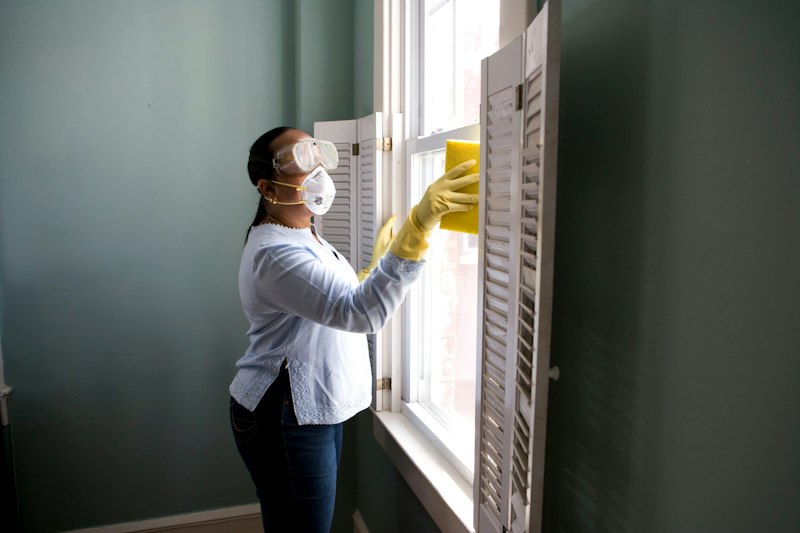 Technician servicing home HVAC under warranty